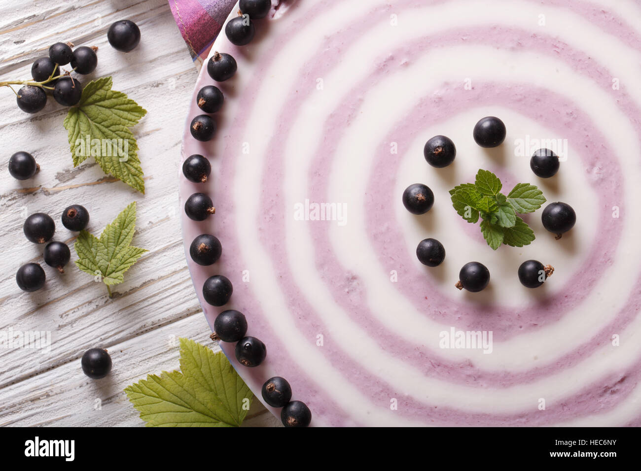 striped currant cheesecake close-up on the table. horizontal view from above Stock Photo