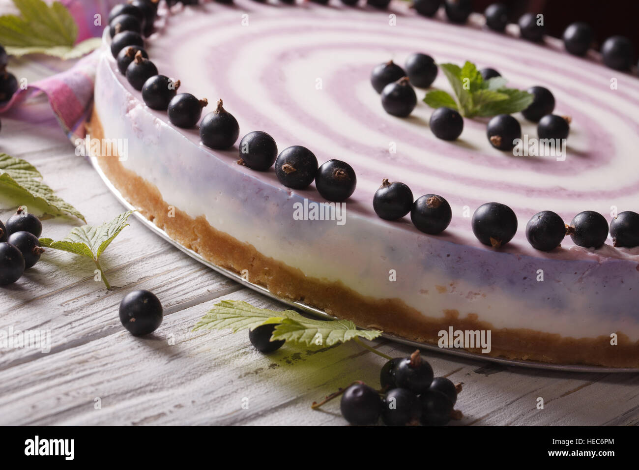 Beautiful striped currant cheesecake macro on a table. horizontal Stock Photo