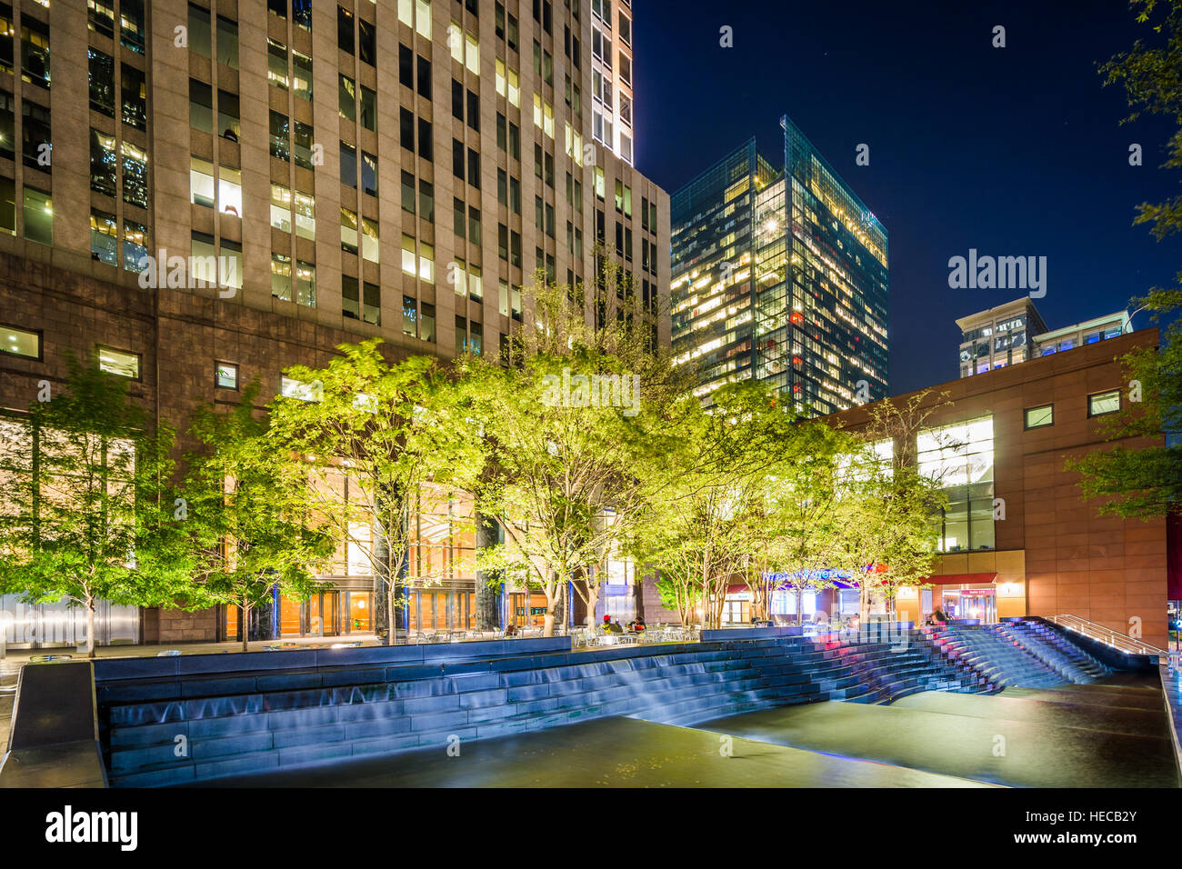 Fountains and modern buildings at night, in Uptown Charlotte, North