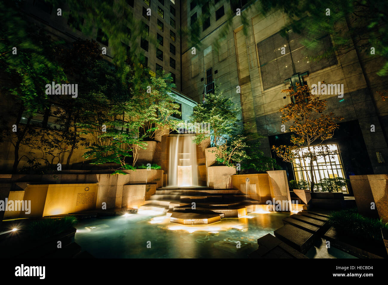 Fountains at Thomas Polk Park at night, in Uptown Charlotte, North