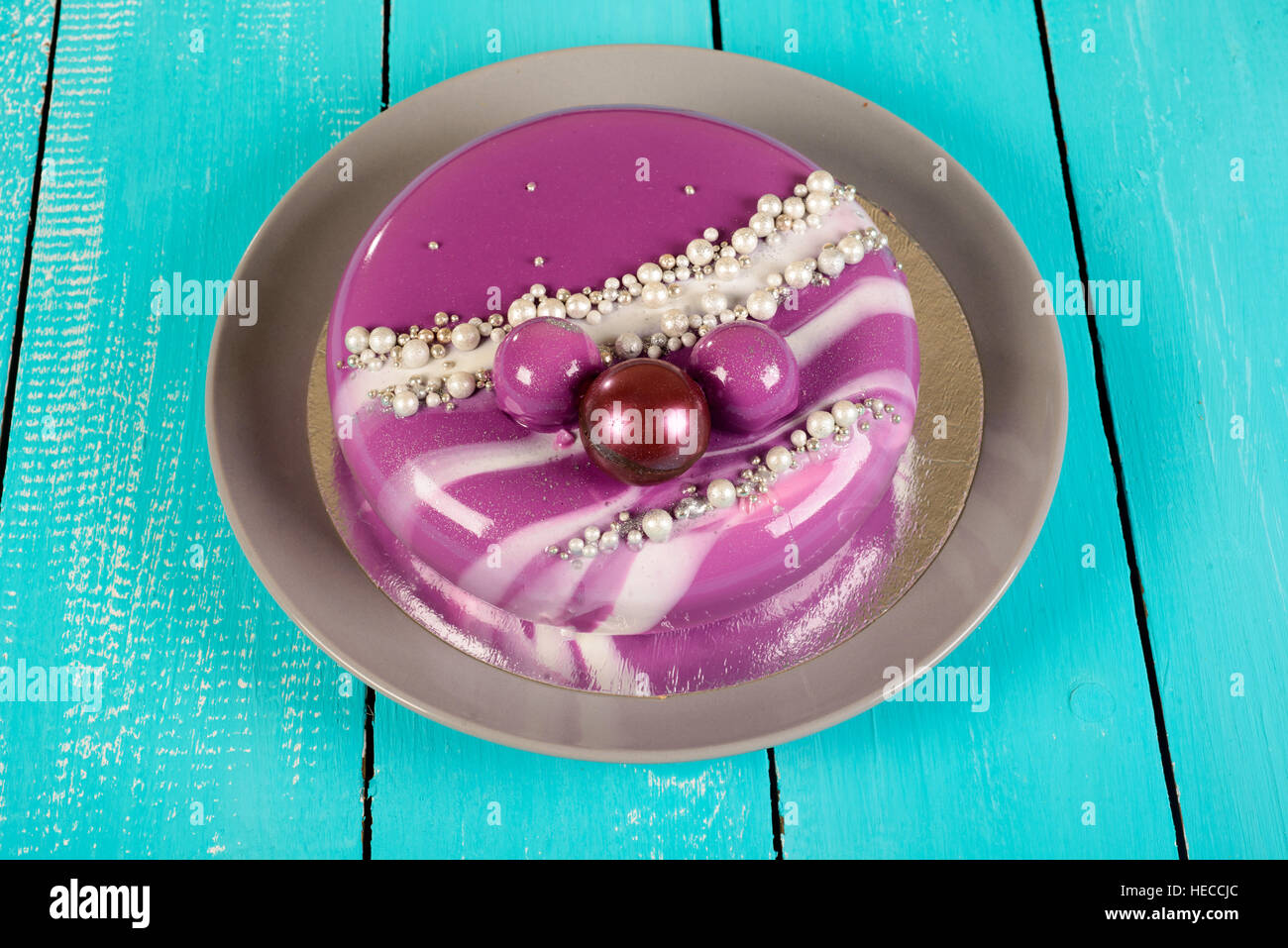 mirror glaze mousse cake with coconut biscuits Stock Photo Alamy