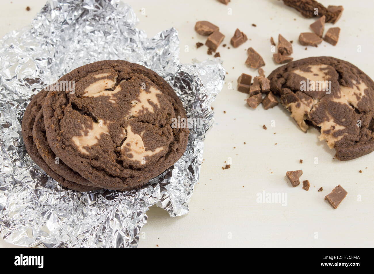 Chocolate chip brown cookies on aluminum foil Stock Photo