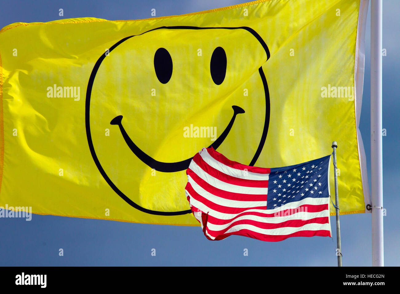 Smiley faced flag and flag of the United States of America Stock Photo