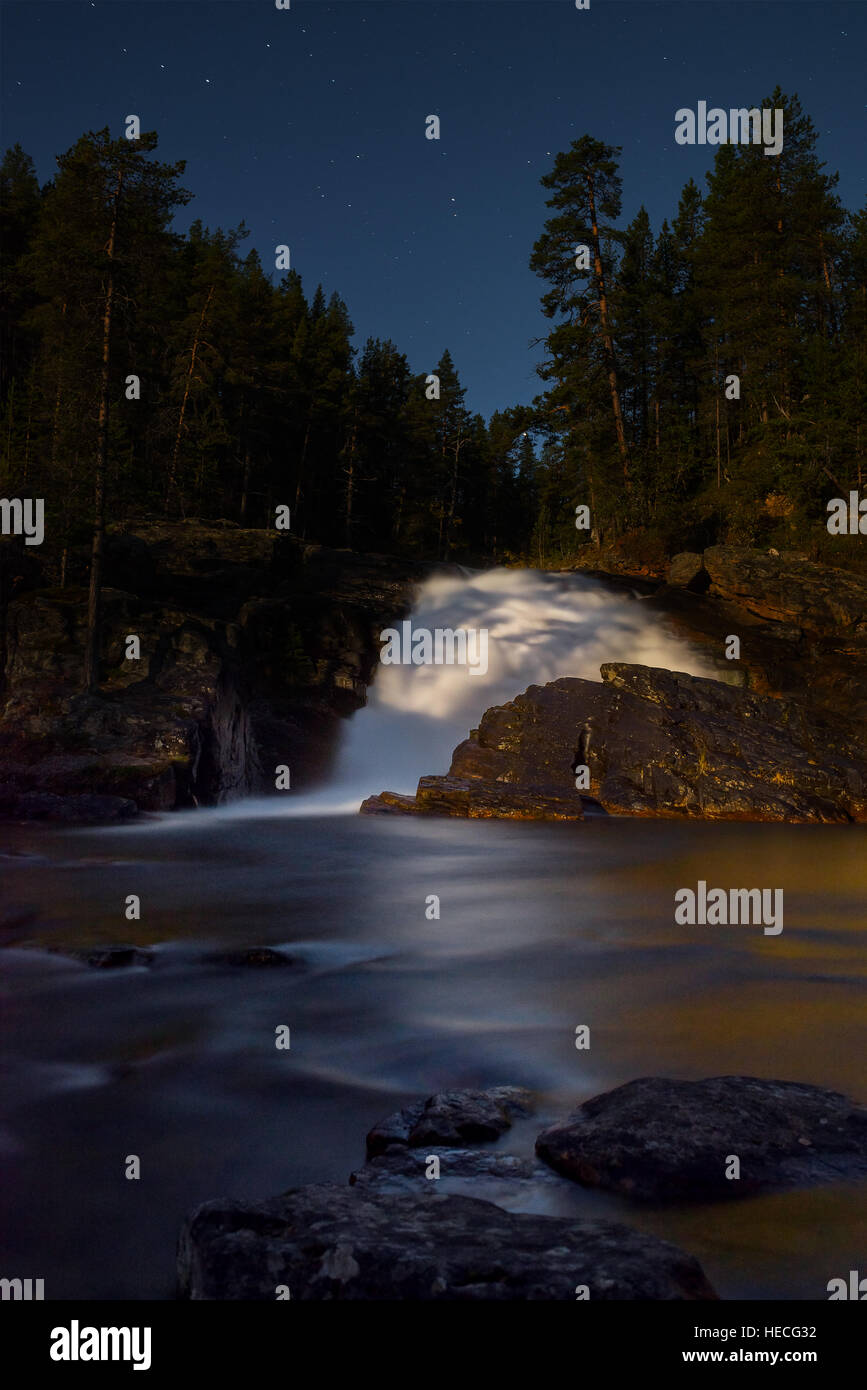 Waterfall in night landscape Stock Photo