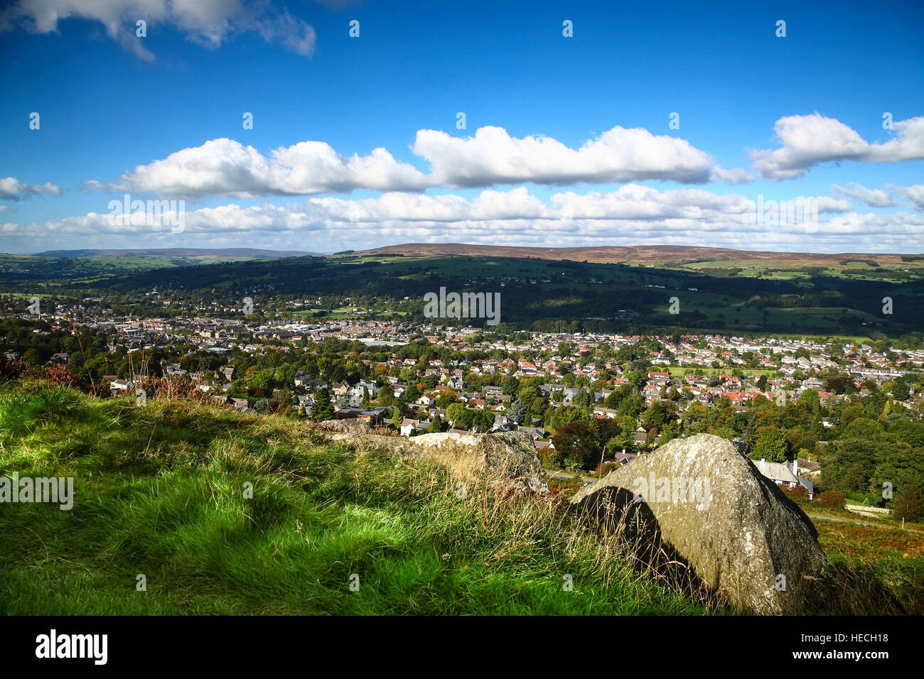 Landscape view looking towards the town of Ilkley on a warm sunny day taken from Ilkley moor Yorkshire England UK Stock Photo