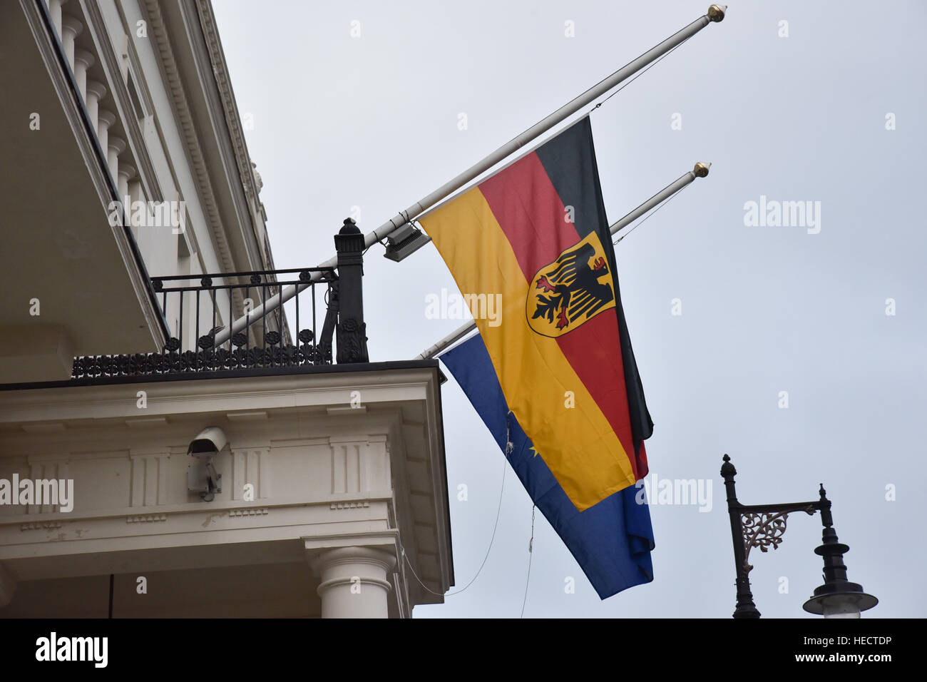 London, UK. 20th Dec, 2016. Flags fly at half mast at the German and
