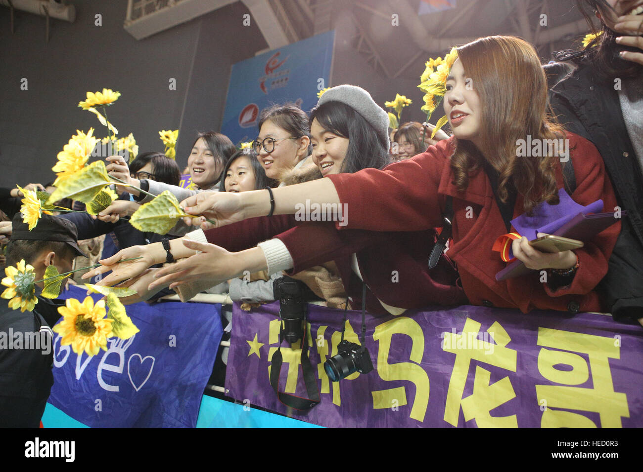 Binzhou, Binzhou, China. 20th Dec, 2016. Binzhou, CHINA-December 20 2016: (EDITORIAL USE ONLY. CHINA OUT) Fans of Ma Long.The Olympic champion Ma Long celebrates the victory of his team at the preliminary of China Table Tennis Super League 2016 in Binzhou, east China's Shandong Province, December 20th, 2016. Ma Long is a Chinese table tennis player. As of December 2016, he is ranked number 1 in the world by the International Table Tennis Federation (ITTF), a ranking he has held for a total of 52 months, more than anyone else except Wang Liqin © SIPA Asia/ZUMA Wire/Alamy Live News Stock Photo