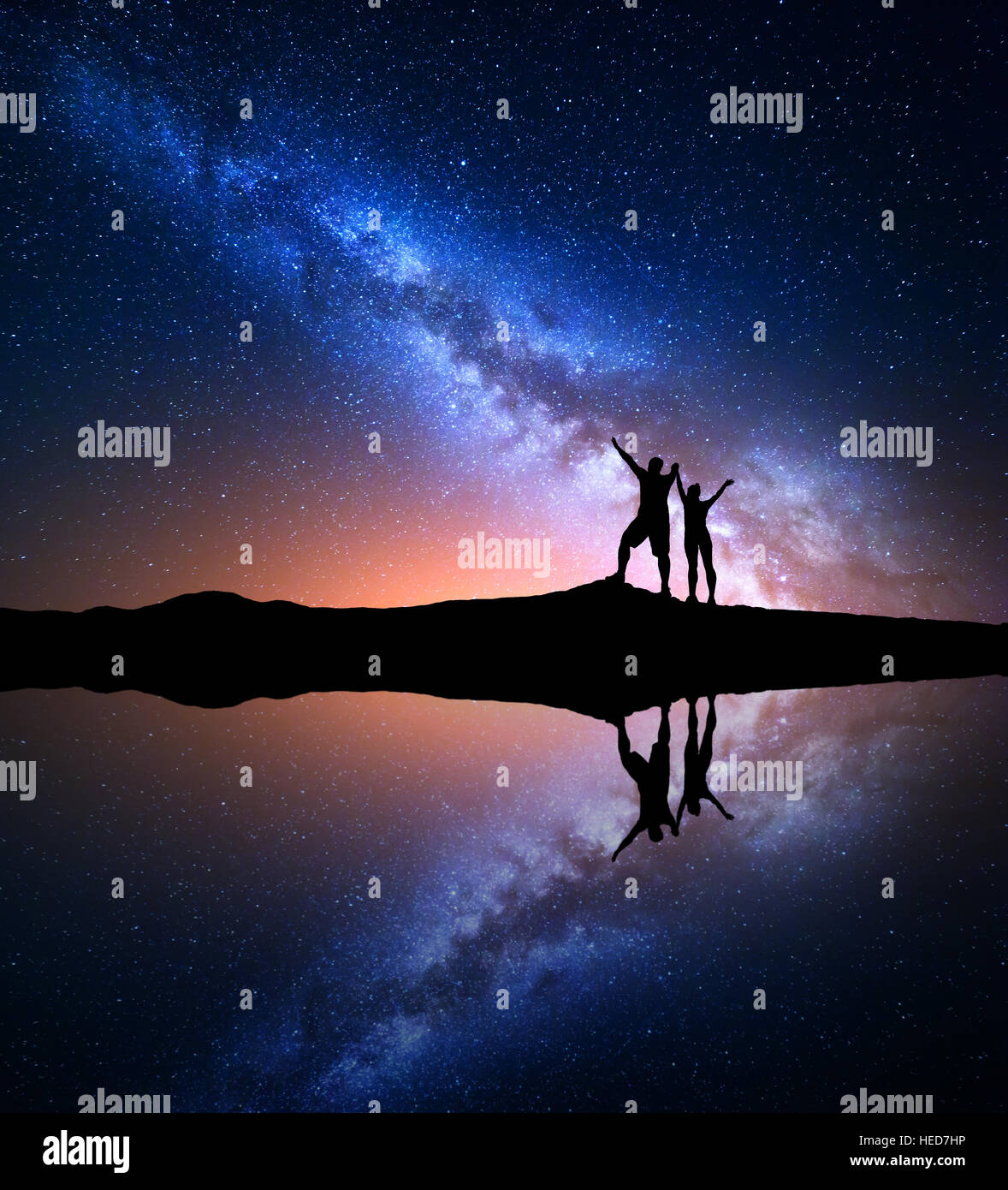 Milky Way. Night starry sky and silhouette of standing happy man and ...