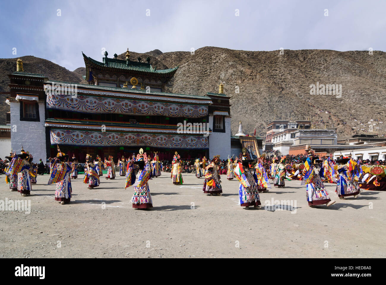 Xiahe: Tibetan Monastery Labrang at the Monlam Festival; Cham dance (mask dance) by monks, Tibet, Gansu, China Stock Photo