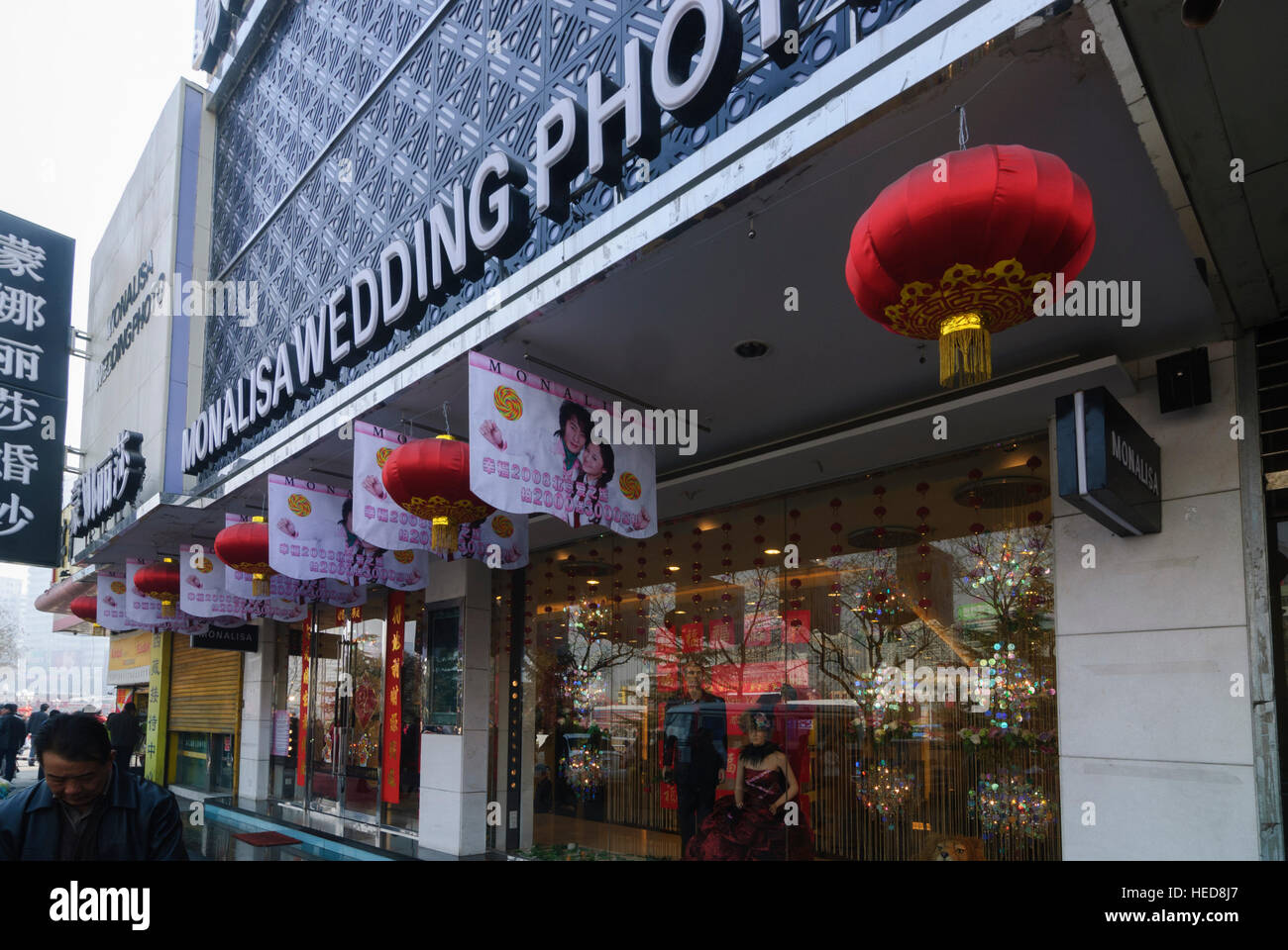 Lanzhou: Business shop for wedding photos, booming in China, Gansu, China Stock Photo