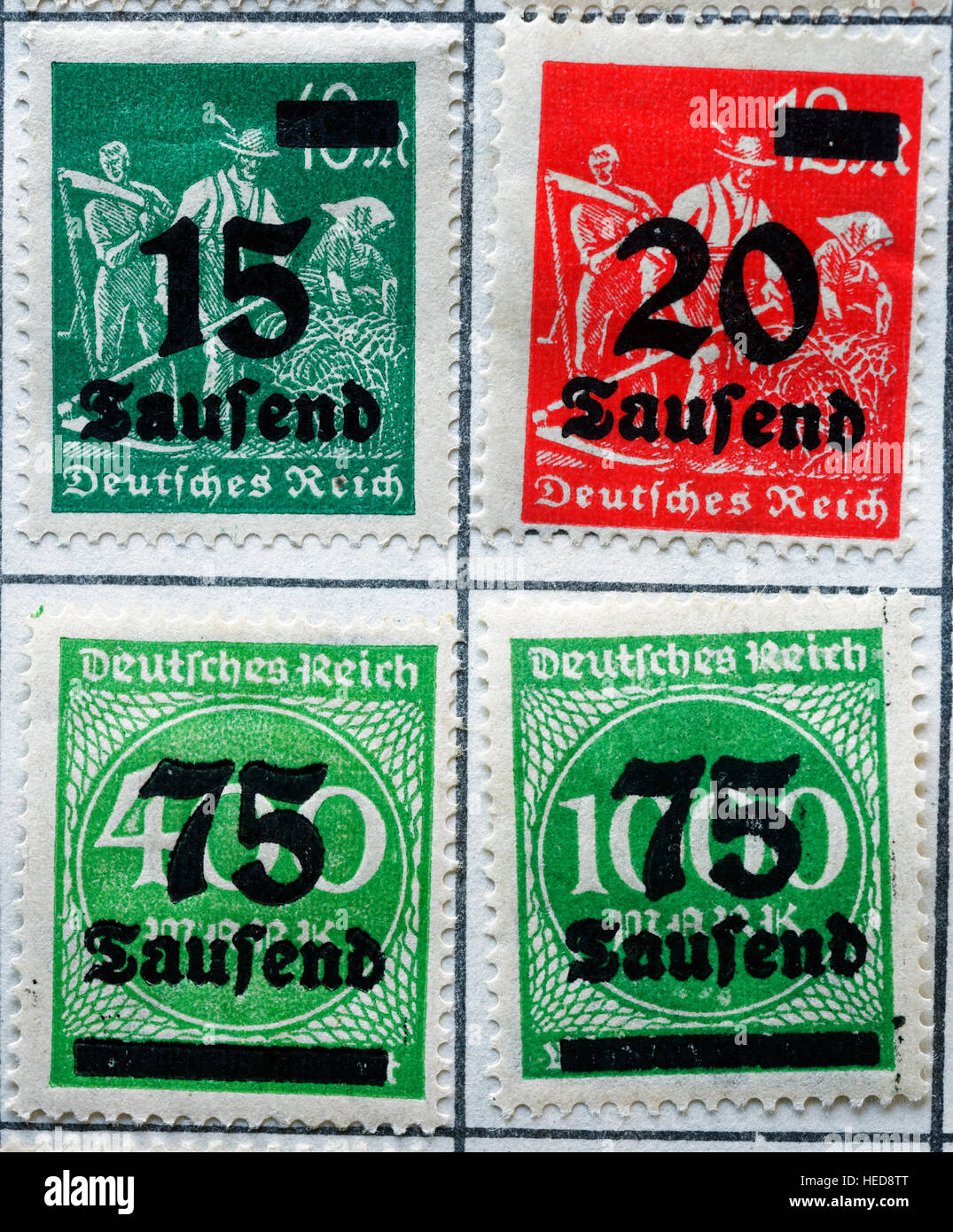 Overprinted stamps from the German hyperinflation period of 1923-1924, with new, higher, values printed on lower value stamps Stock Photo