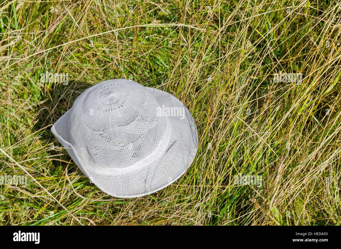 White hat abandon in the glade, Vitosha mountain, Bulgaria Stock Photo