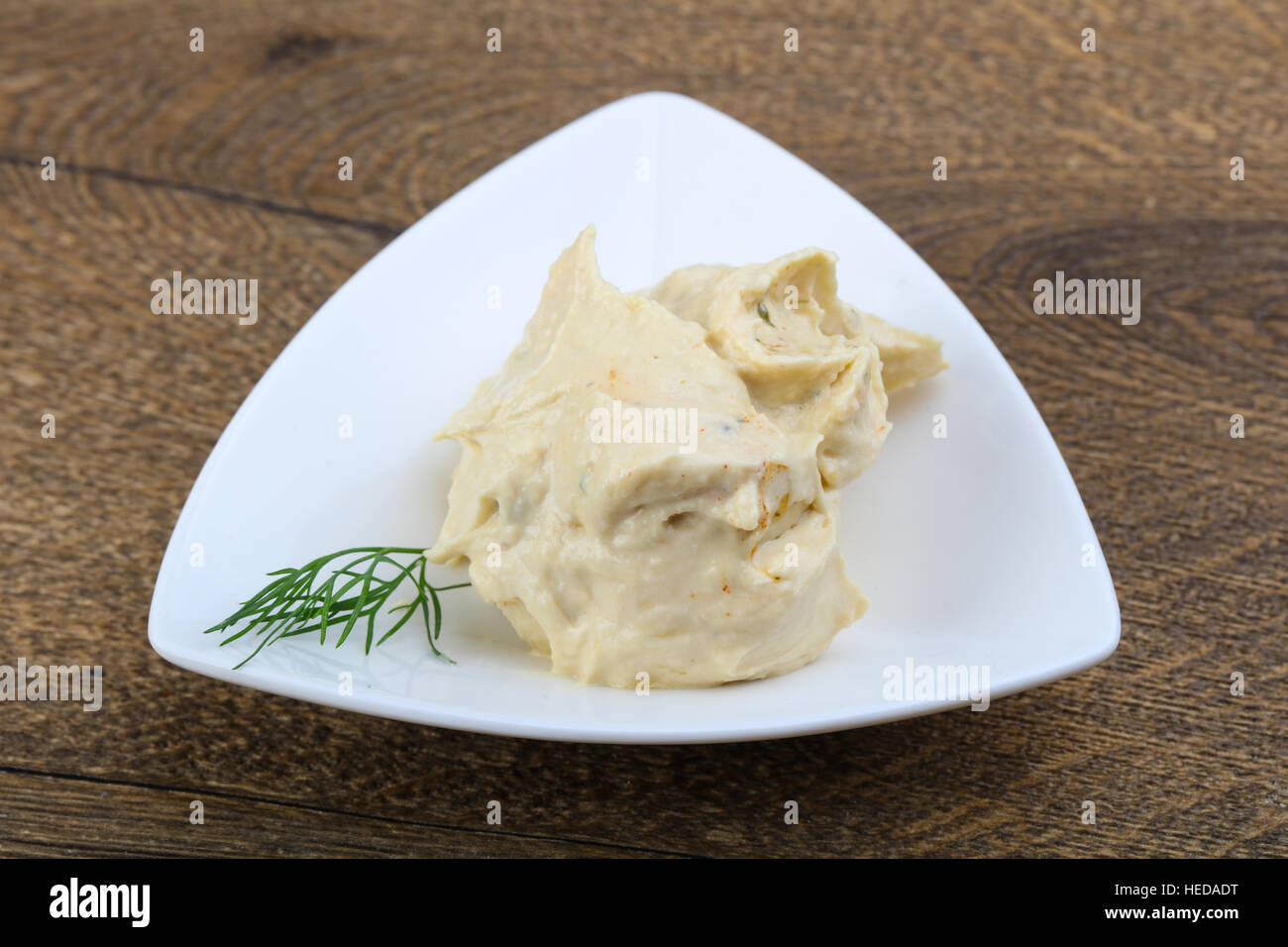 Arabic traditional cusine hummus with dill and cedar nuts Stock Photo