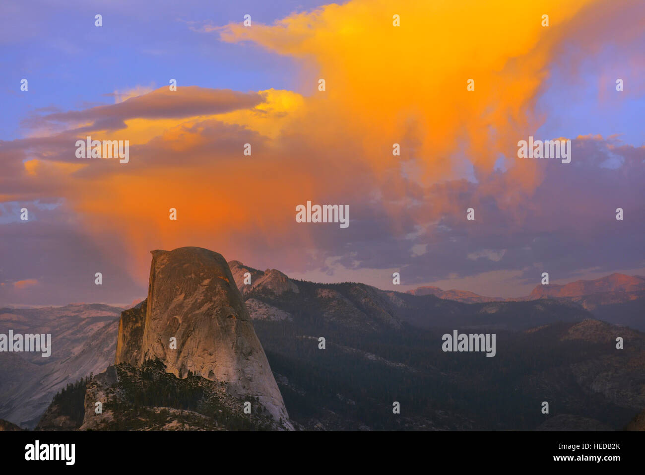 Illuminated clouds above Half Dome, evening light, Glacier Point, Yosemite National Park, California, USA Stock Photo