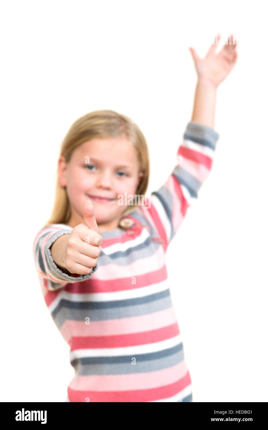 Portrait of a beautiful and confident girl showing thumbs up isolated ...