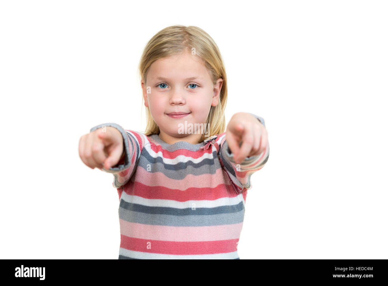 Little girl pointing on something with hand Stock Photo - Alamy