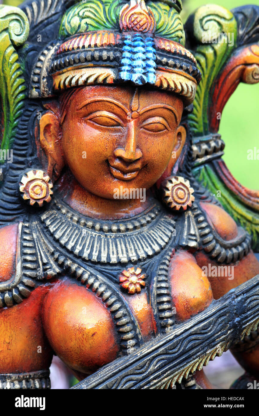 Wooden Statue of Hindu Goddess Saraswathi Stock Photo