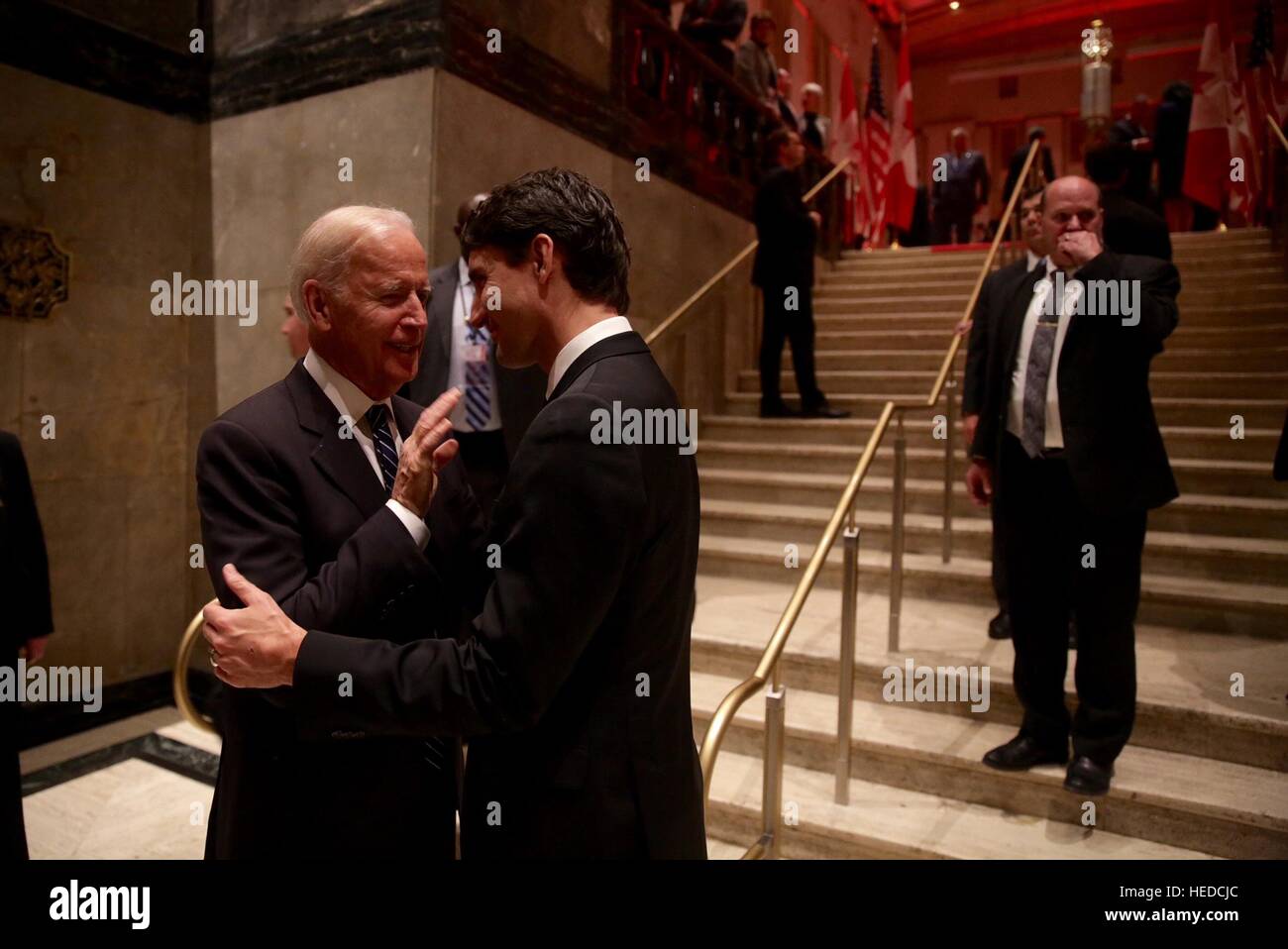 U.S. Vice President Joe Biden and Canadian Prime Minister Justin Trudeau talk after a dinner event December 8, 2016 in Ottawa, Ontario, Canada. Stock Photo