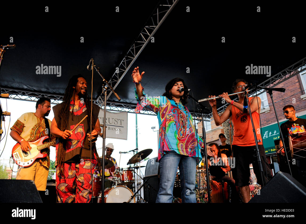 Chicago musical group, Funkadesi, playing at local neighborhood festival. Stock Photo