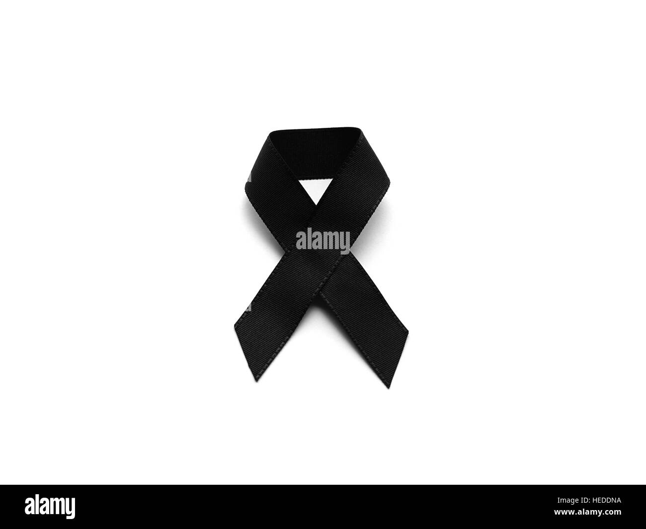 Black ribbon for mourning isolated on white background Stock Photo