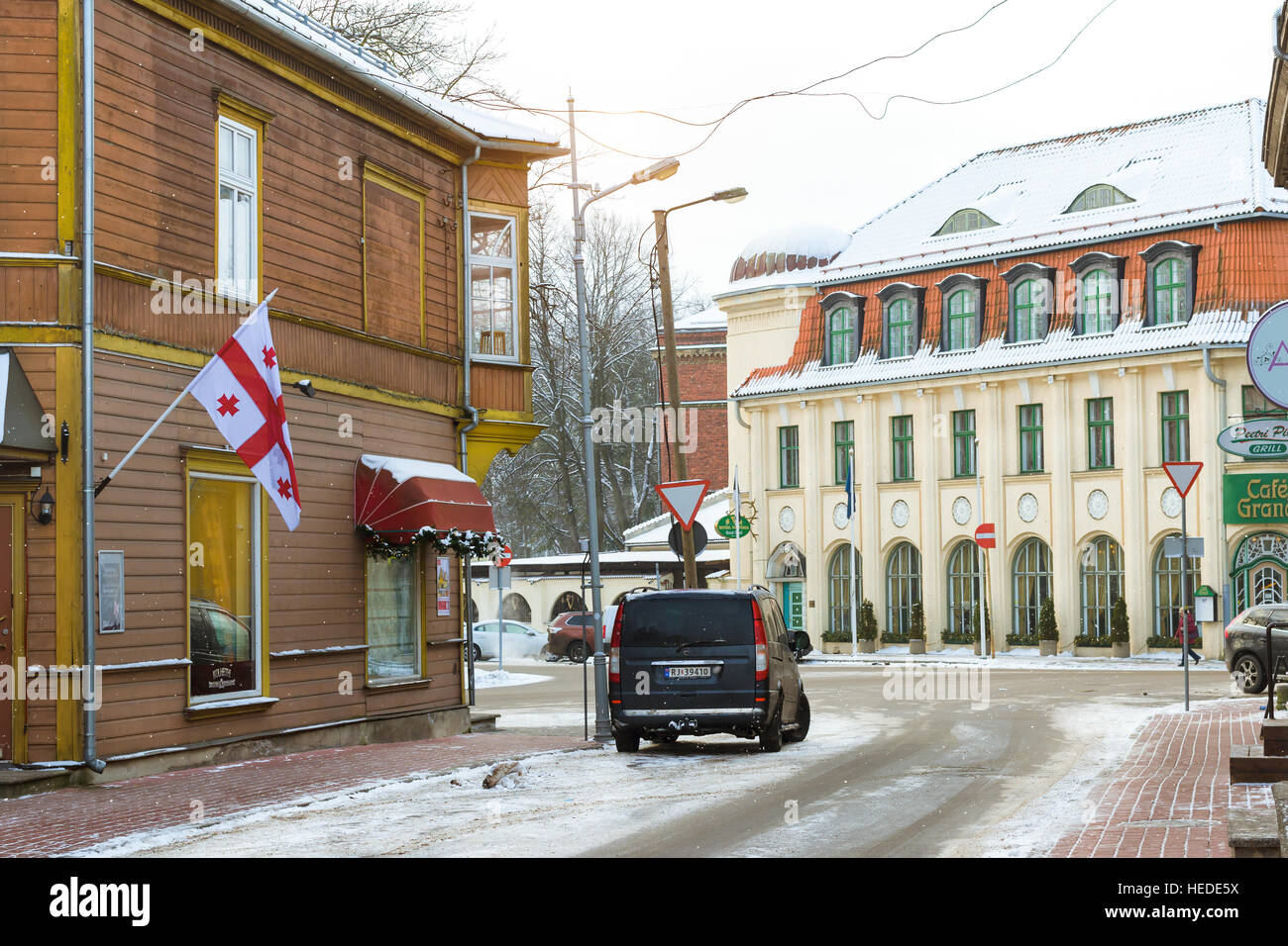 Parnu, Estonia - January 10, 2016: Architectural diversity in centre of resort Estonian town Parnu. Historic buildings and attractions. Georgia flag Stock Photo