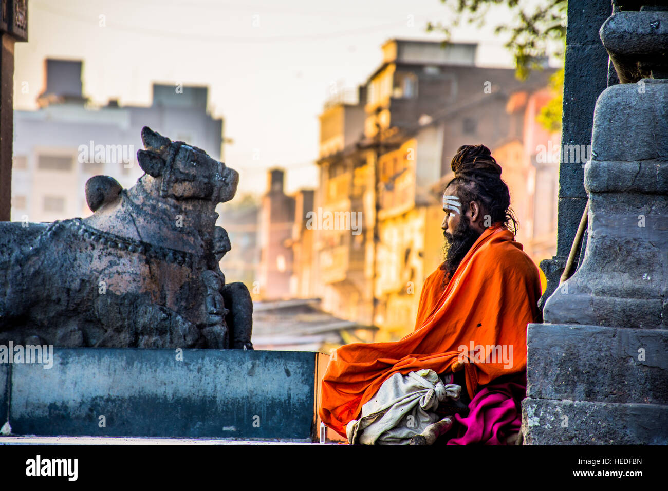 A sadhu peacefully doing his meditation. Stock Photo