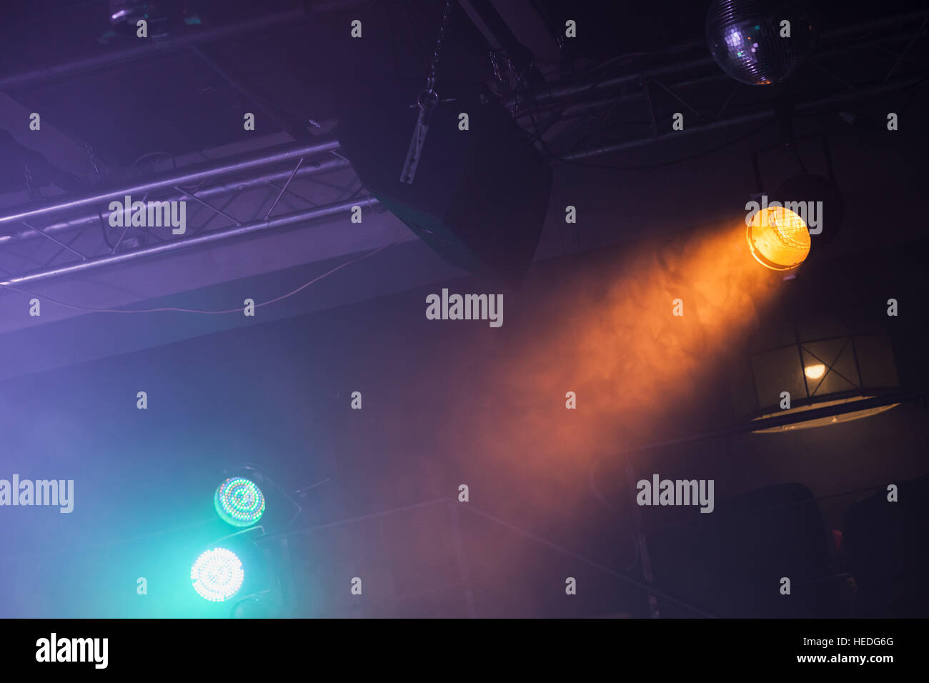 Spot lights over dark ceiling background, rock music concert stage illumination equipment Stock Photo