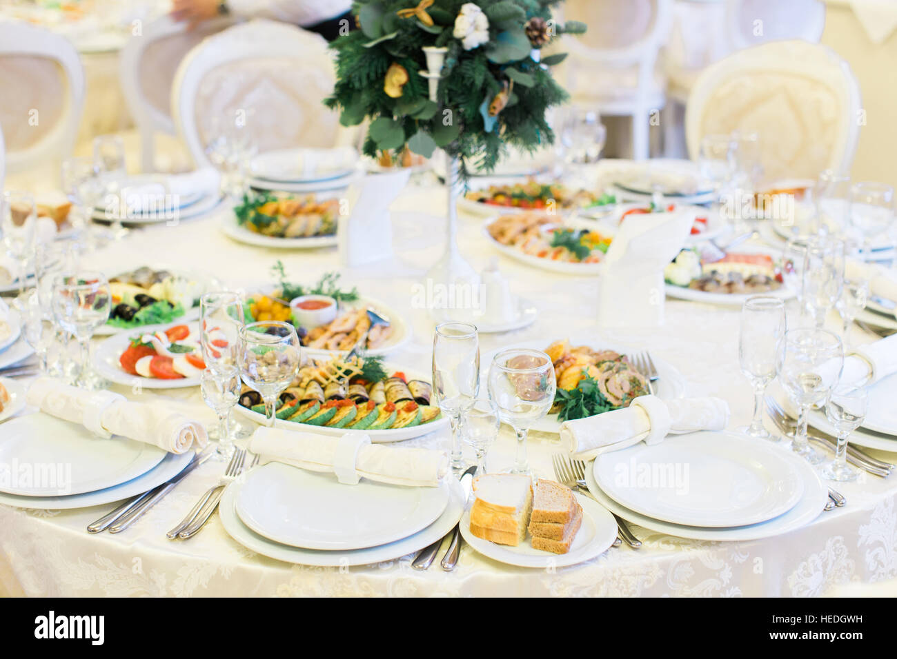 Banquet wedding table setting on evening reception Stock Photo