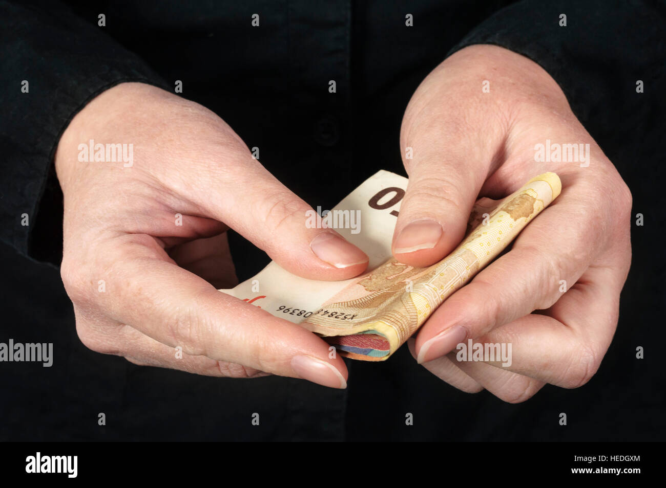 Hand holding Euro banknotes. Business concept. Stock Photo