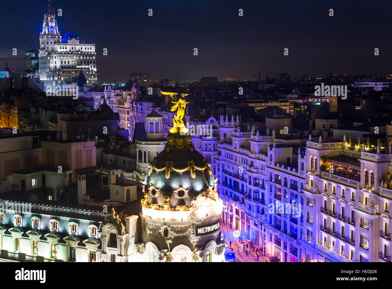 Metropolis and Gran Via at dusk. Madrid Spain. Stock Photo