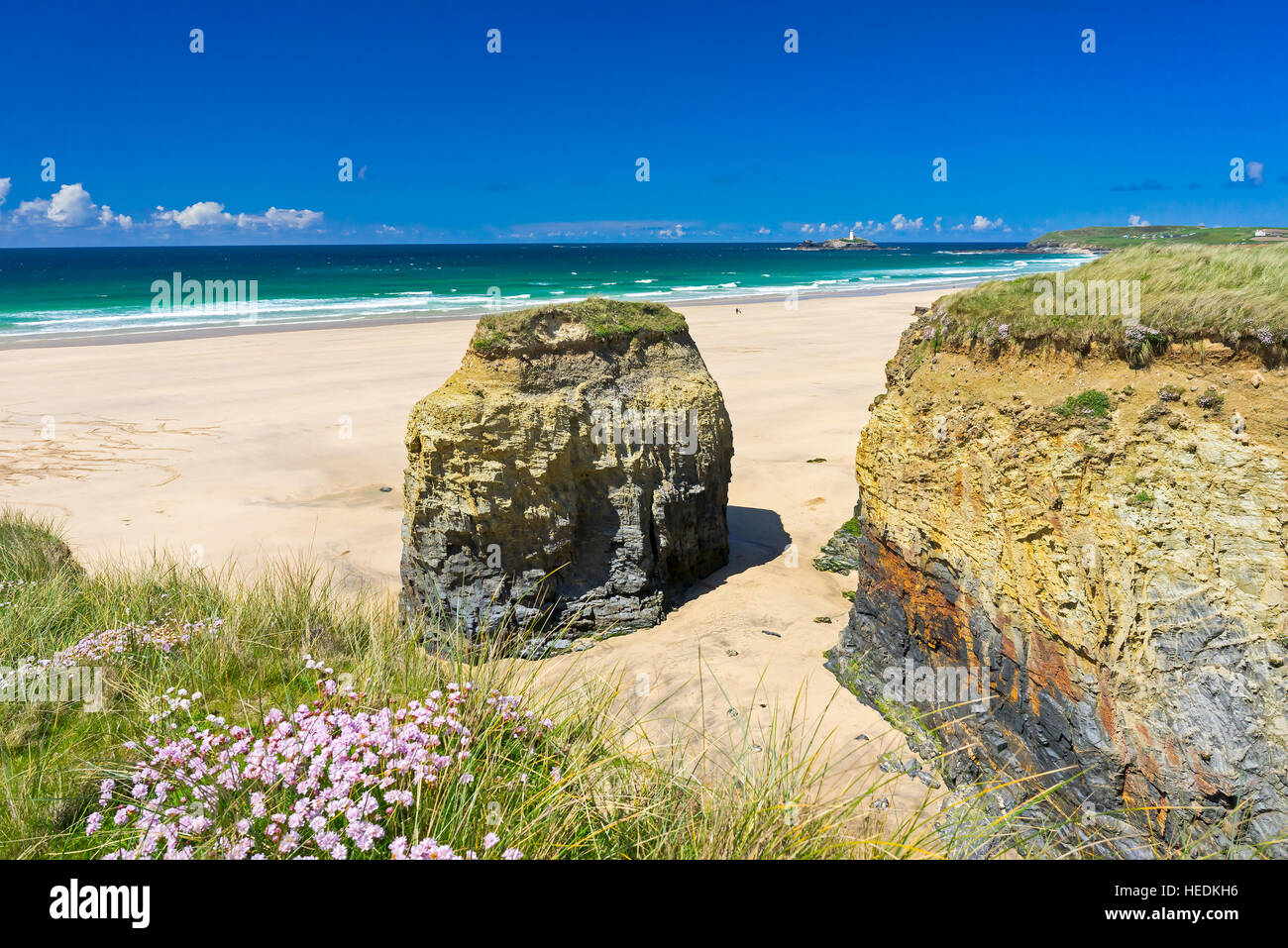 The beautiful golden sandy beach at Gwithian with Godrevy in the distance Cornwall England UK Europe Stock Photo