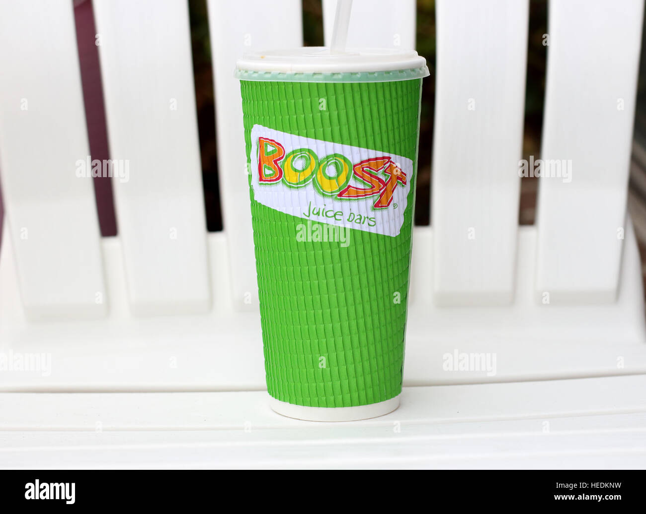 Boost Juice drink in green paper cup Stock Photo - Alamy