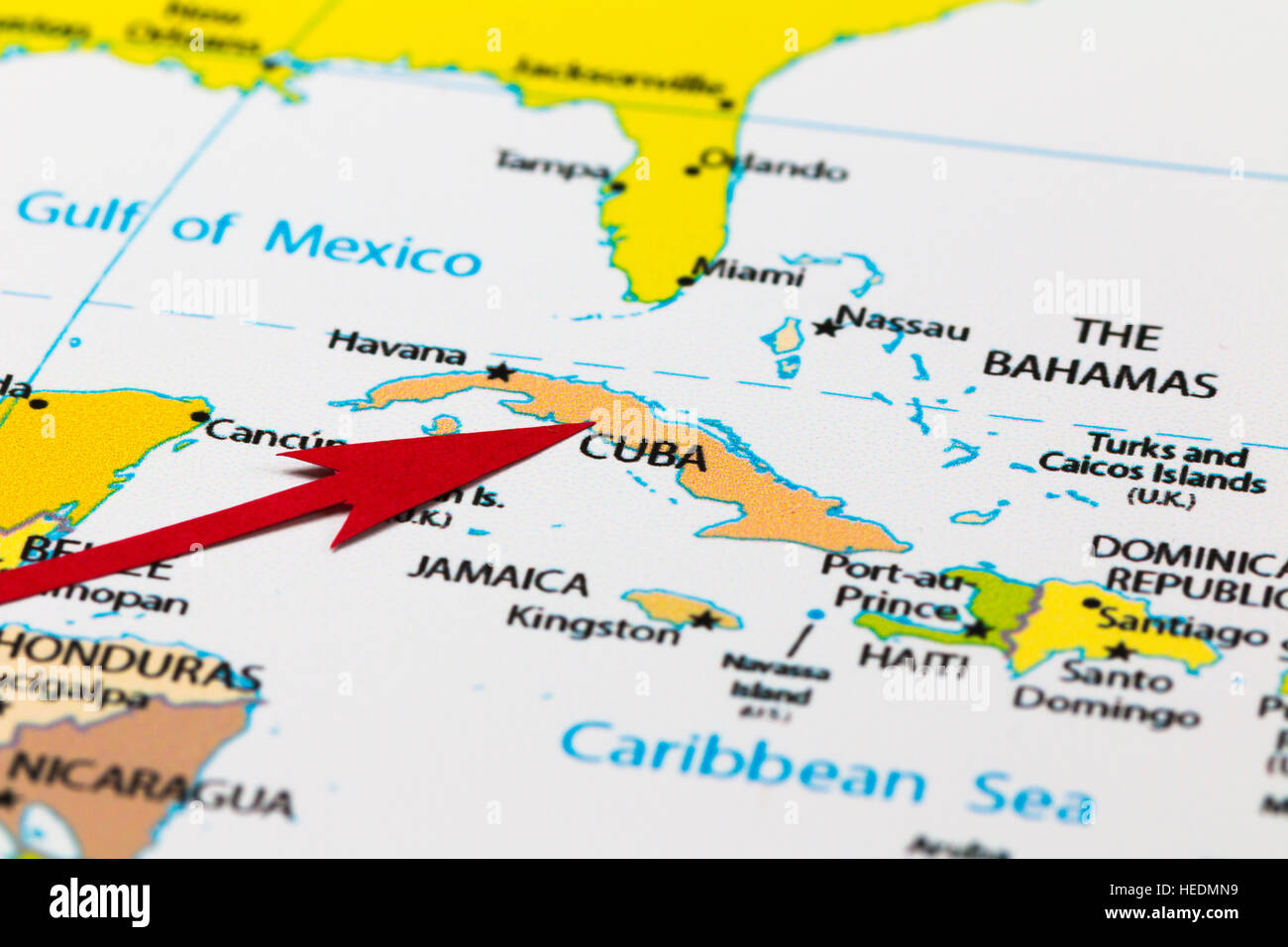 Red arrow pointing Cuba on the map of Caribbean region and north America continent Stock Photo