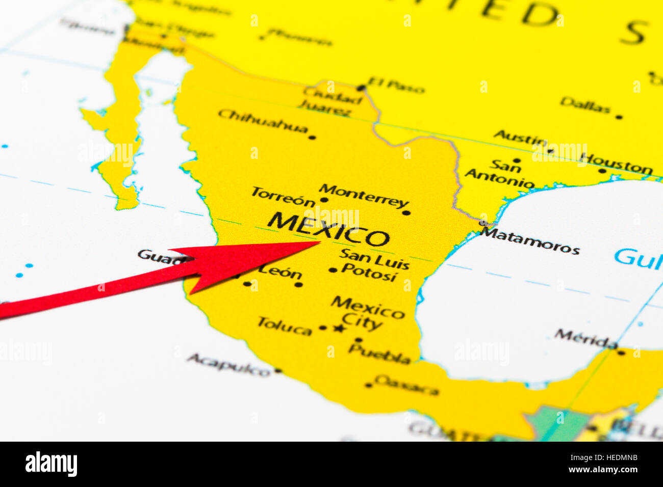 Red arrow pointing Mexico on the map of central America continent Stock Photo