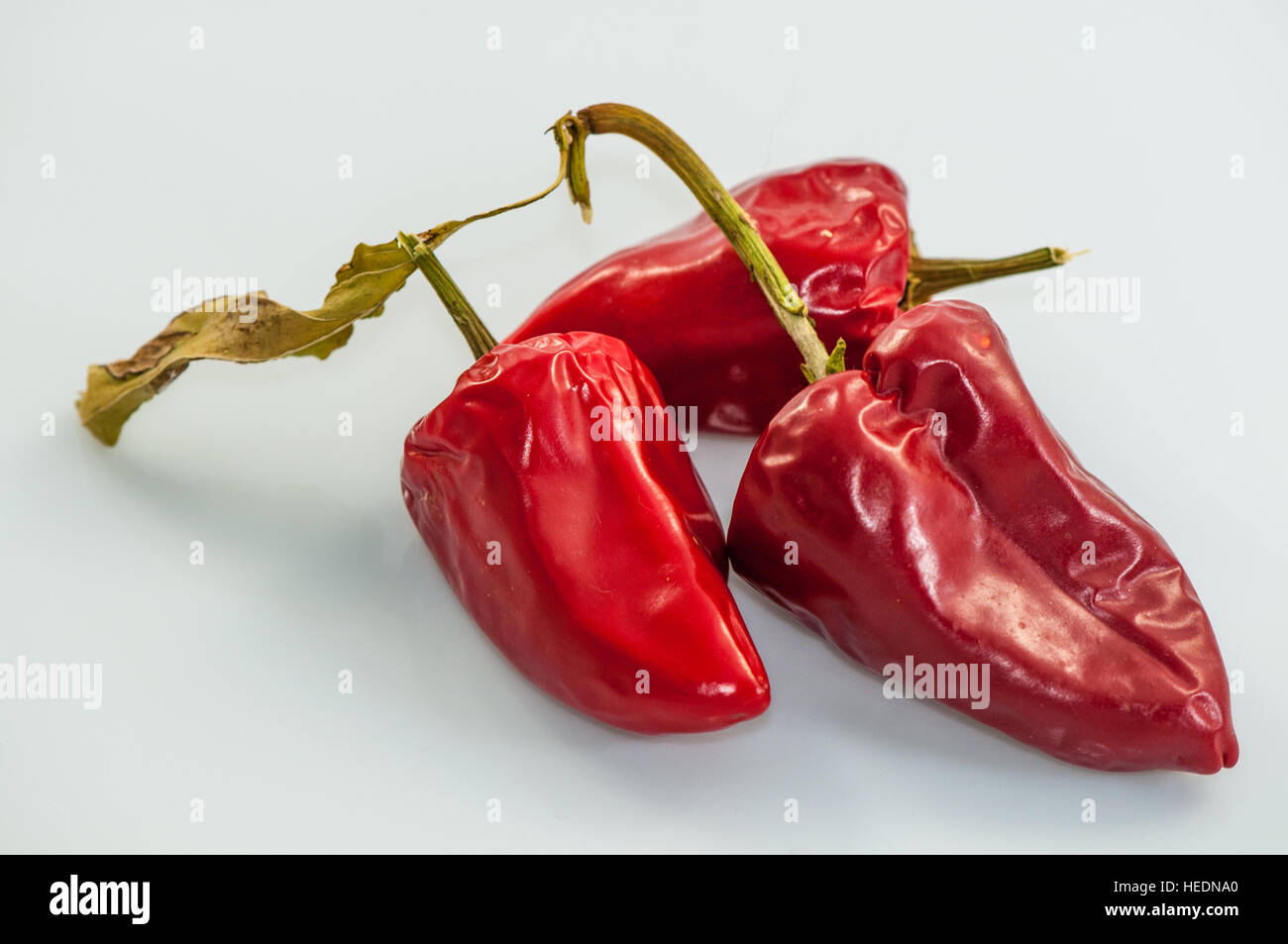 Red pepper overripe over a white background Stock Photo