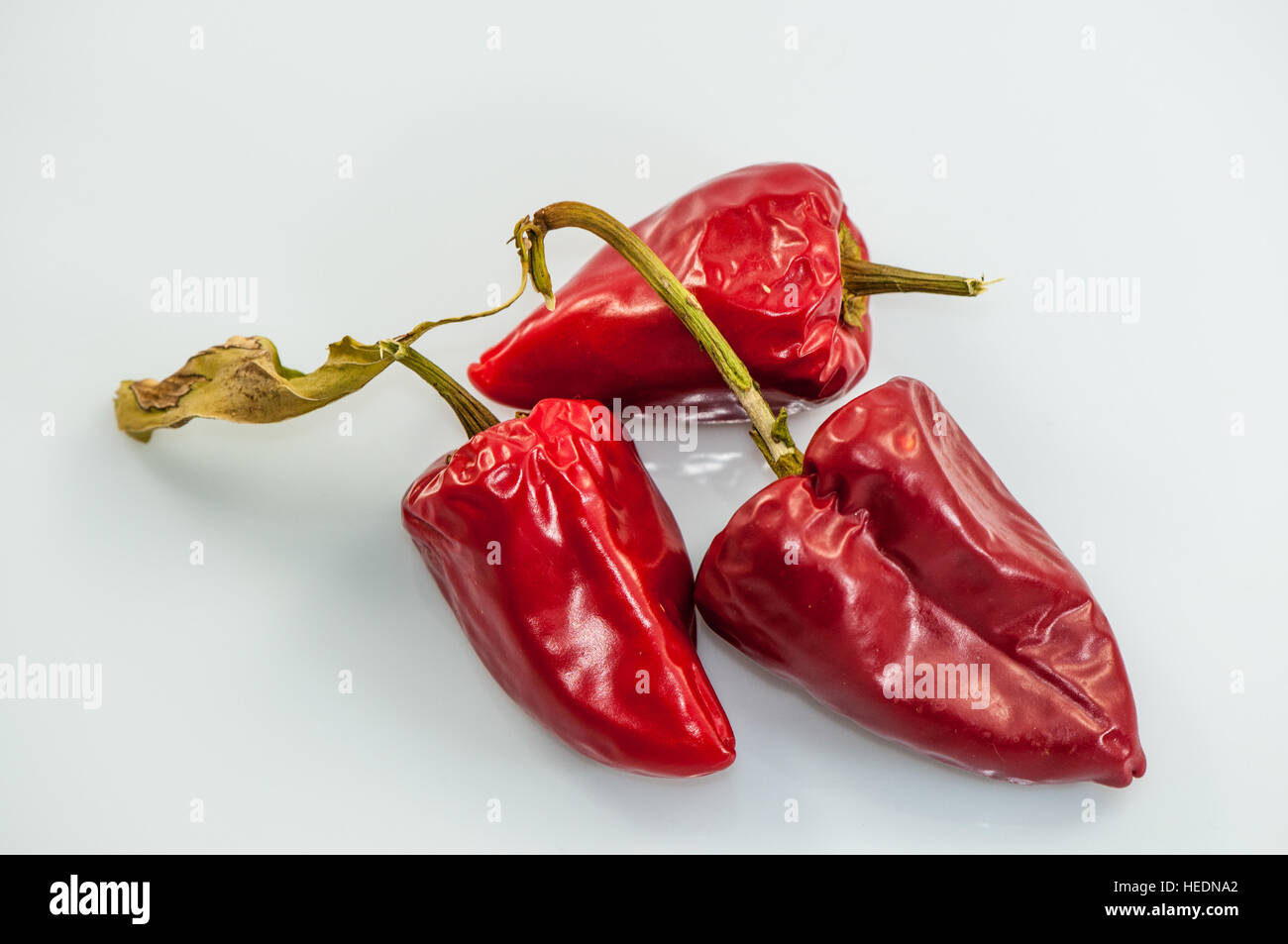 Red pepper overripe over a white background Stock Photo