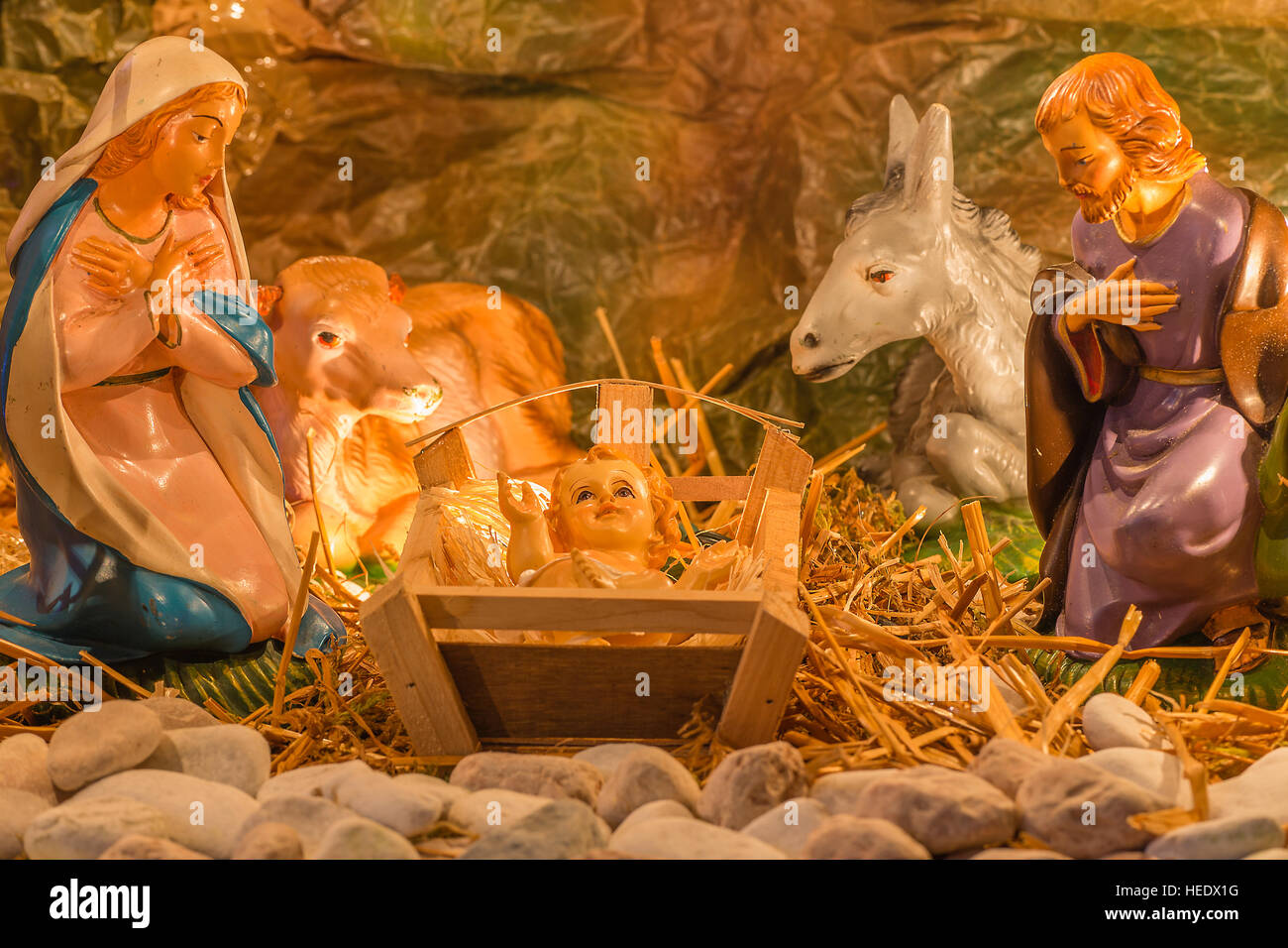 Christmas nativity scene of Holy Baby Jesus in the manger with Blessed ...