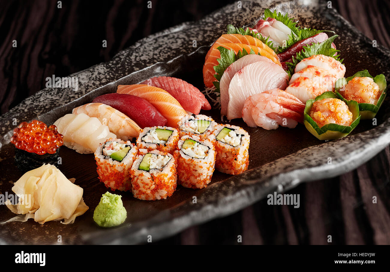 Japanese sushi selection bento box sashimi tempura chop sticks Stock Photo