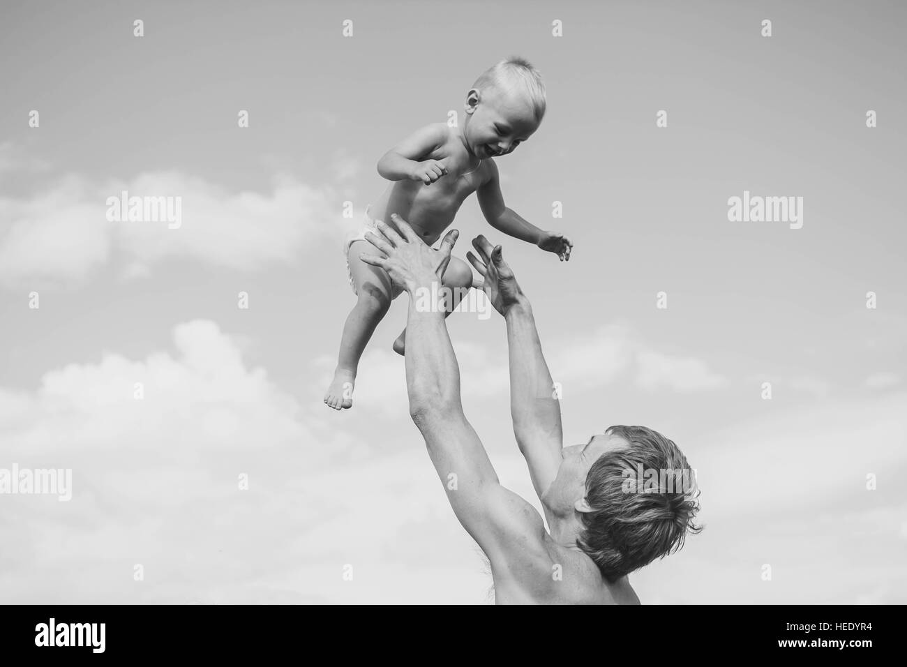 Kid Lifting Kid Stock Photos & Kid Lifting Kid Stock Images Alamy