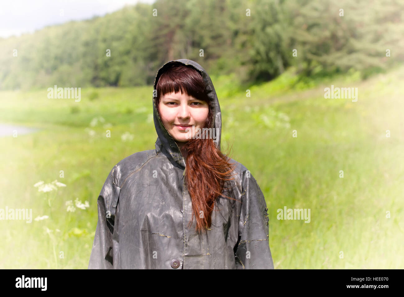 old ragged clothes. girl in a vintage coat chemical protection used in ...