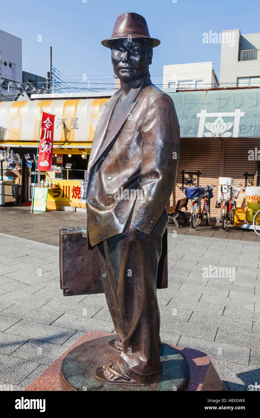 Japan, Honshu, Tokyo, Katsushika Shibamata, Statue of the Actor Kiyoshi Atsumi aka Tora-san Stock Photo