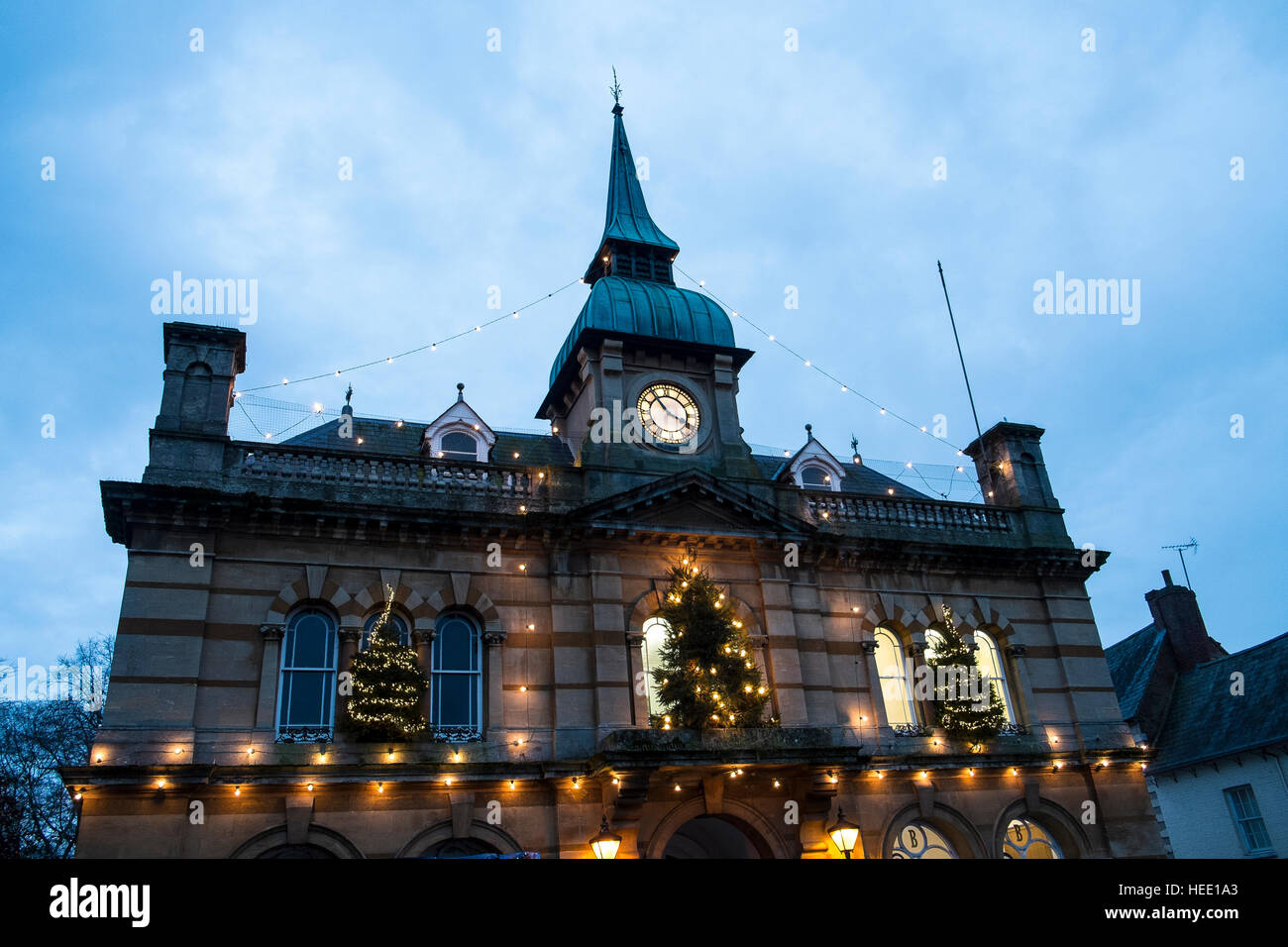 Towcester town hall seen at dusk with decorations over the Christmas period Stock Photo