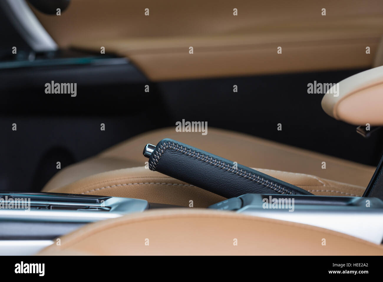 Detail of new modern car interior, Focus on hand break Stock Photo