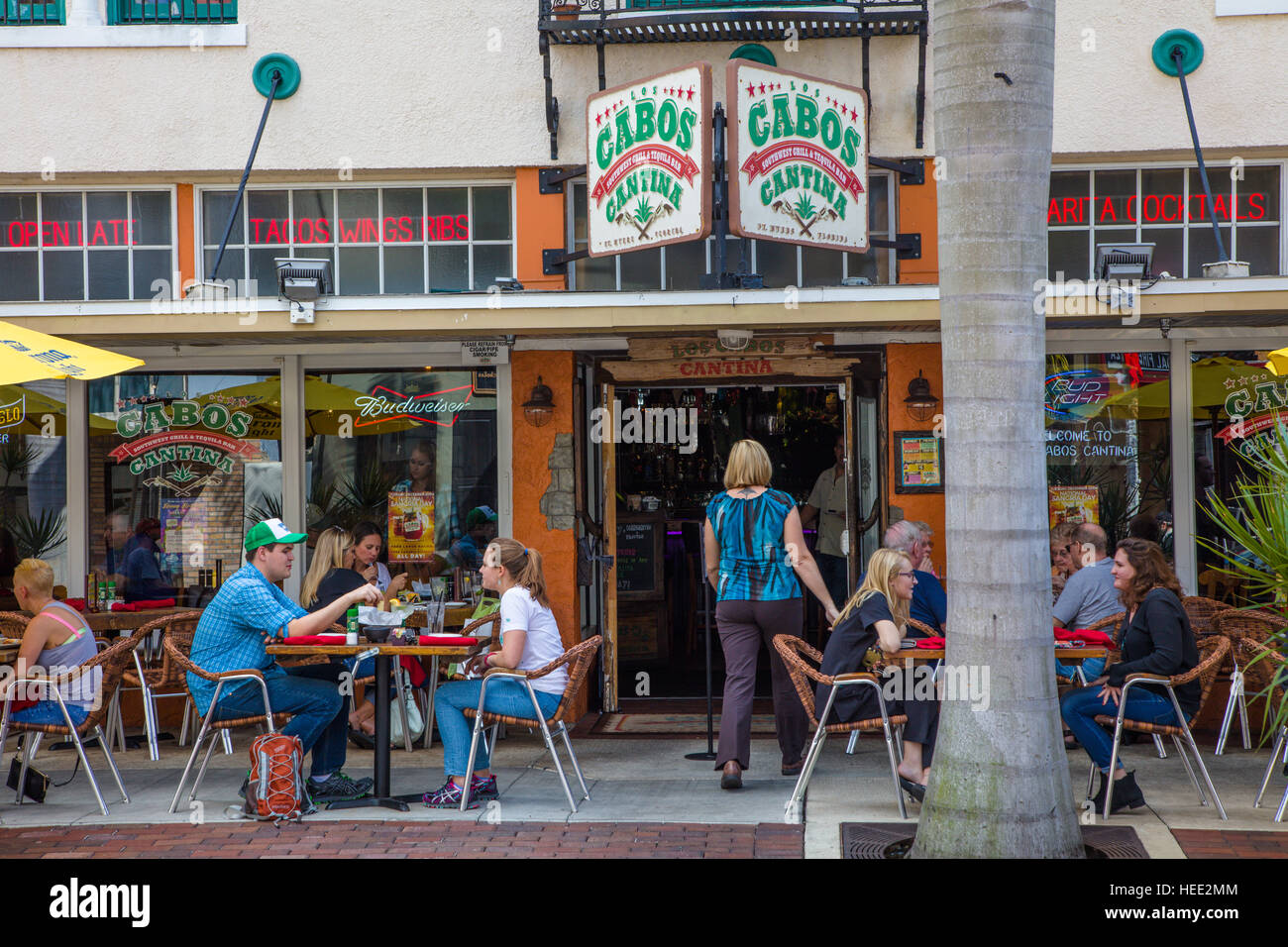 Outdoor dining on sidewalk at restaurant on First Street in Fort Myers