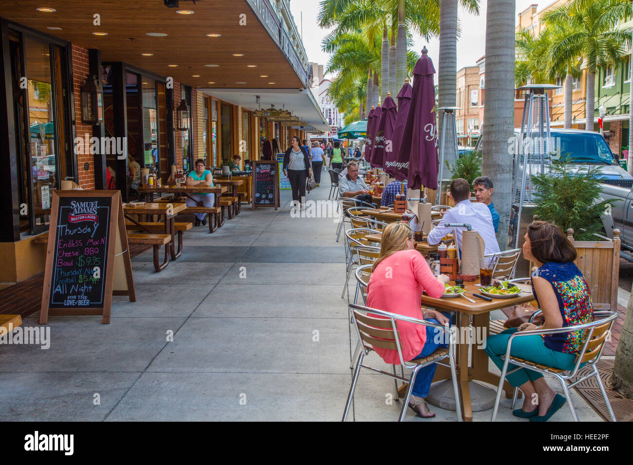 Outdoor dining on sidewalk at restaurant on First Street in Fort Myers