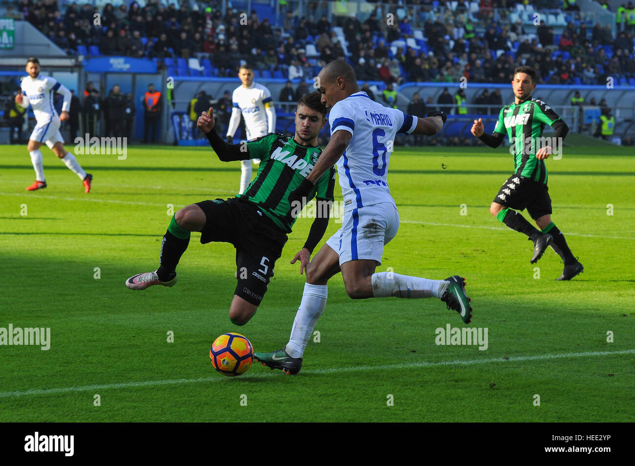 US Sassuolo Calcio vs F.C. Internazionale Milano serie A football championship 2016 2017 US Sassuolo Calcio vs F.C. Internazionale Milano Reggio Emilia Mapei Stadium 18/12/2016 F.C. Internazionale Milano beat Sassuolo for 1 to 0 thanks to goal scored by Antonio Candreva In the pic: Joao Mário Naval da Costa Eduardo F.C. Internazionale Milano's midfielder and national team of Portugal and Luca Antei Sassuolo's defender fight for the ball during the serie A football match between US Sassuolo Calcio and F.C. Internazionale Milano at Mapei Stadium in Reggio Emilia ph Massimo Morelli (Photo by Mass Stock Photo