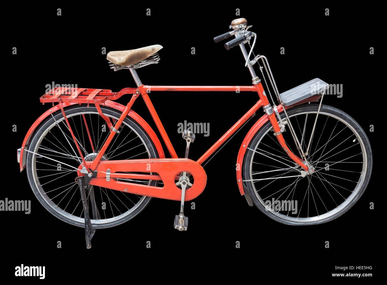 Red vintage bicycle isolated on black background. Saved with clipping