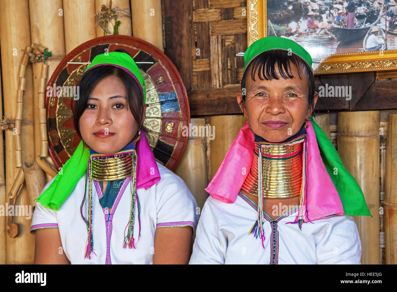 NYAUNGSHWE, MYANMAR - MARCH 1, 2014: unidentified Padaung (Karen) tribe  women poses for the camera in Nyaungshwe, Myanmar. Stock Photo