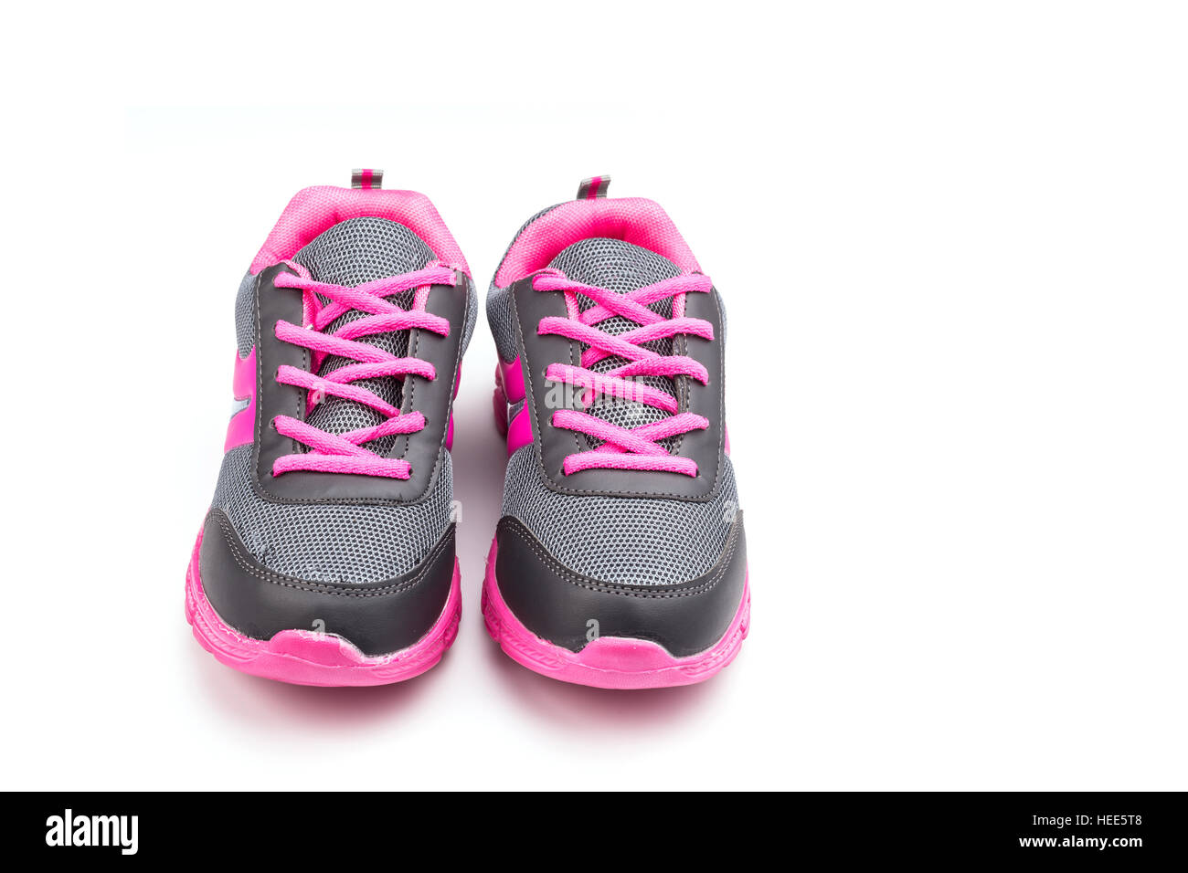 New pink sport shoe isolated on white background Stock Photo - Alamy