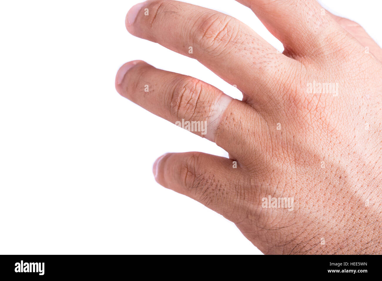 Close up mark of ring on finger isolated on white background Stock